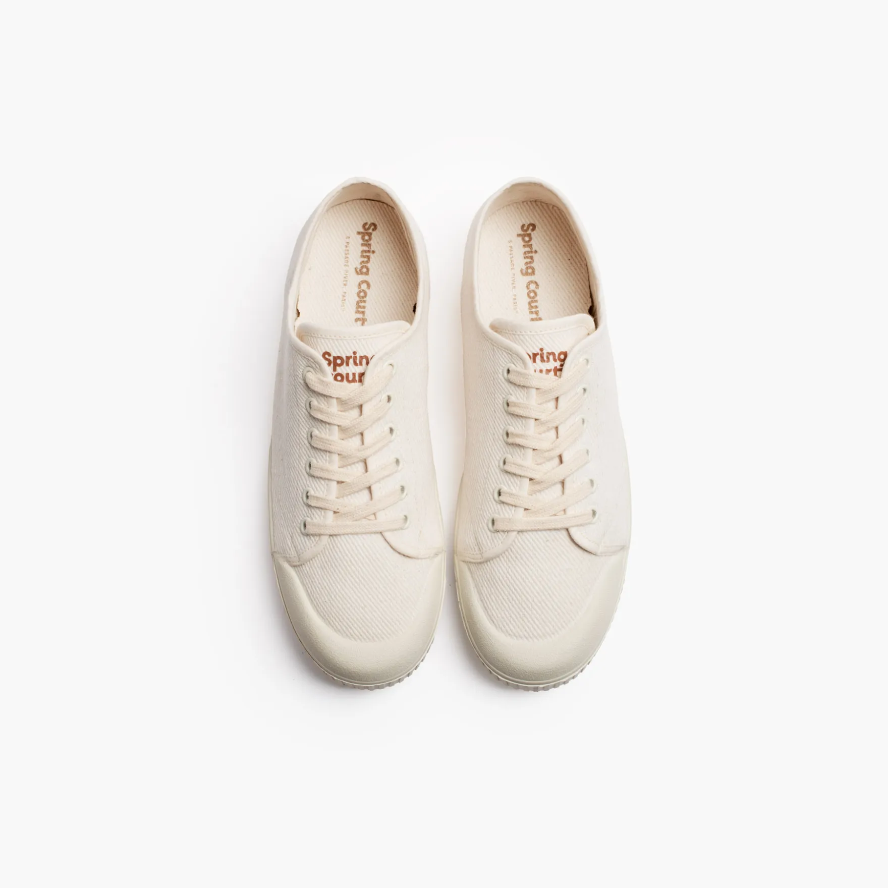 La tennis blanche en toile de Spring Court