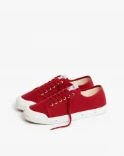 Low top red canvas trainers